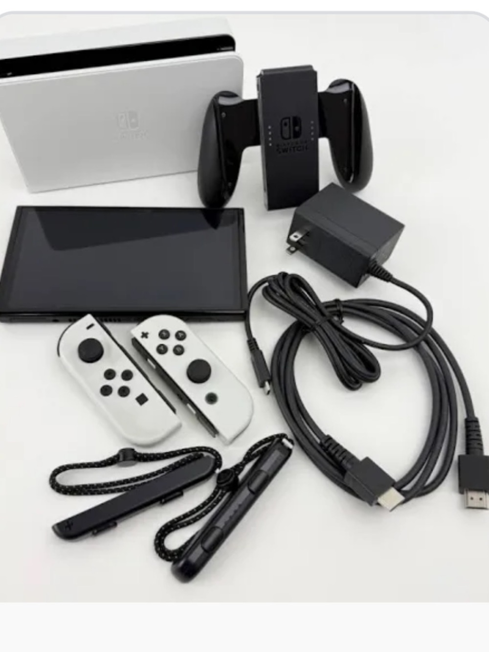 Nintendo Switch OLED Console with White Joy‑Con Accessories